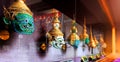 Ã¢â¬ÅKhonÃ¢â¬Â the Thais traditional masks in a glass display cabinet